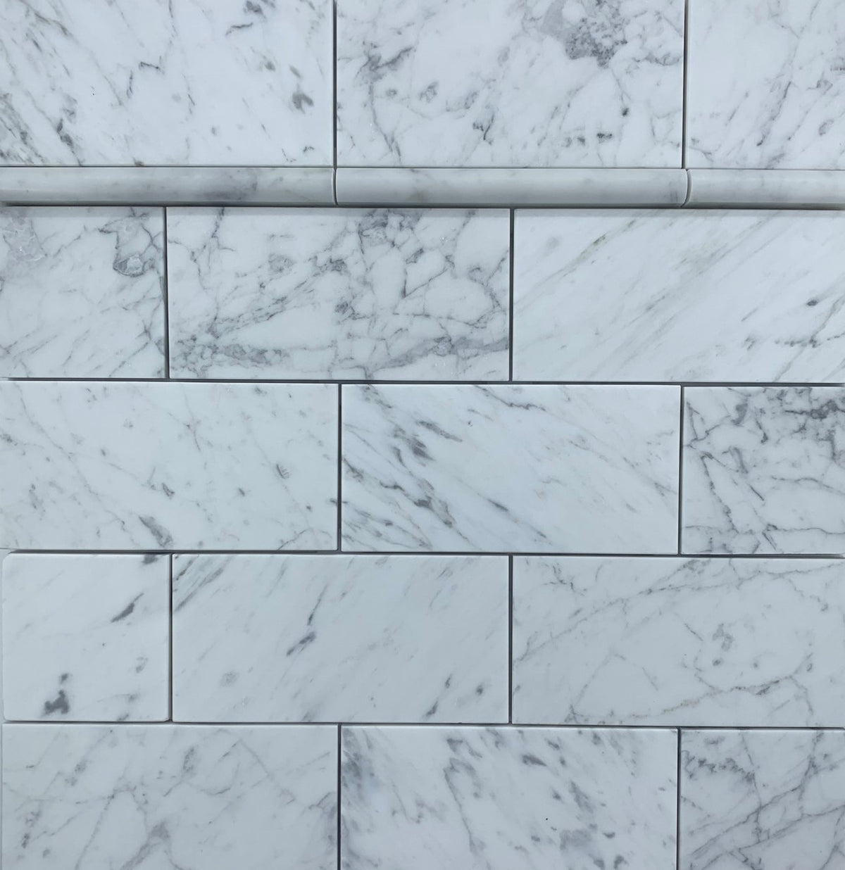 SUBWAY CARRARA HONED 305X75