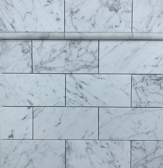 SUBWAY CARRARA HONED 305X75